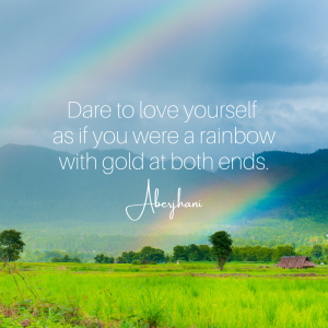 meadow and mountains with two rainbows and a quote from Aberjhani, "Dare to love yourself as if you were a rainbow with gold at both ends".
